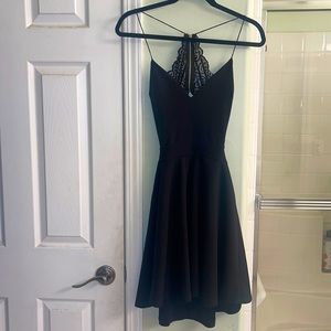 Lace back zip up skater style black dress